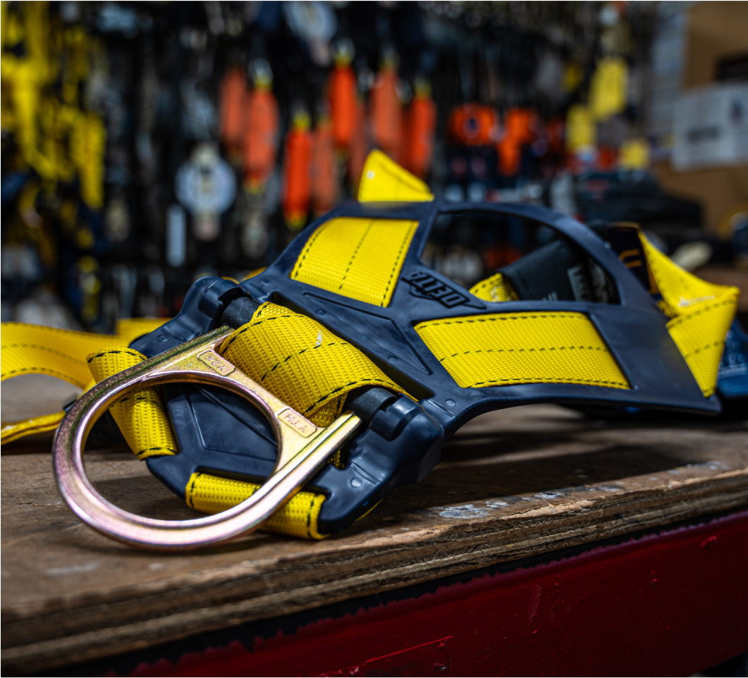 Close up image of a safety harness on a construction worksite.